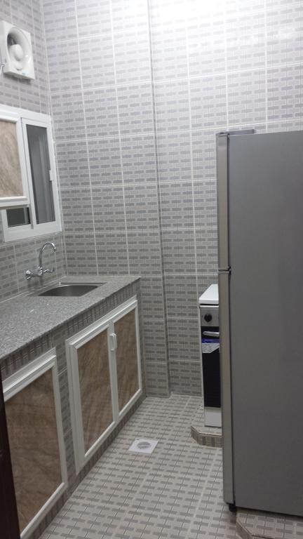 Golden Seasons Furnished Apartment Салала Номер фото