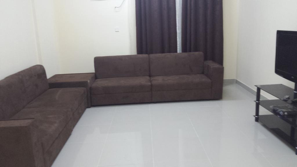 Golden Seasons Furnished Apartment Салала Номер фото