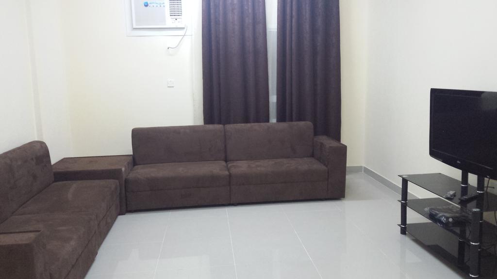 Golden Seasons Furnished Apartment Салала Номер фото