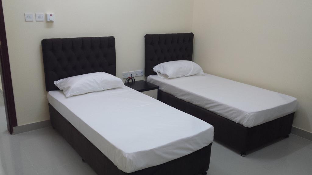 Golden Seasons Furnished Apartment Салала Номер фото