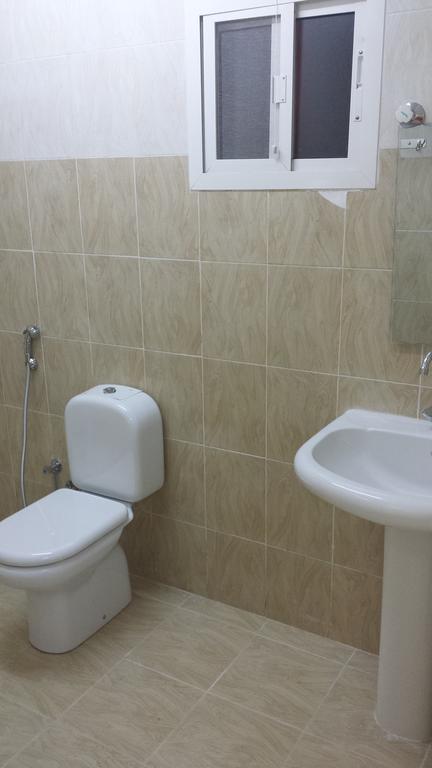 Golden Seasons Furnished Apartment Салала Номер фото